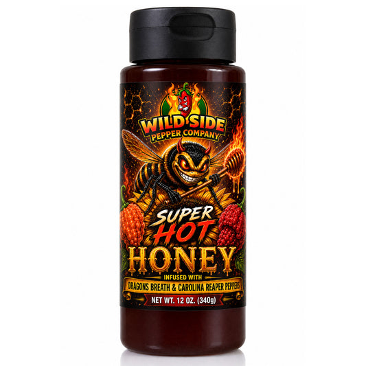 A 12 oz bottle of Wild Side Pepper Company Super Hot Honey, featuring a black cap and a colorful label with a cartoon bee, flames, and hot peppers on a white background.