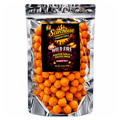 A 4 oz bag of Scorchcheez Wild Fire Cheese Puffs, featuring orange-brown cheese puffs visible through a clear window in a silver stand-up pouch with a black and orange label.