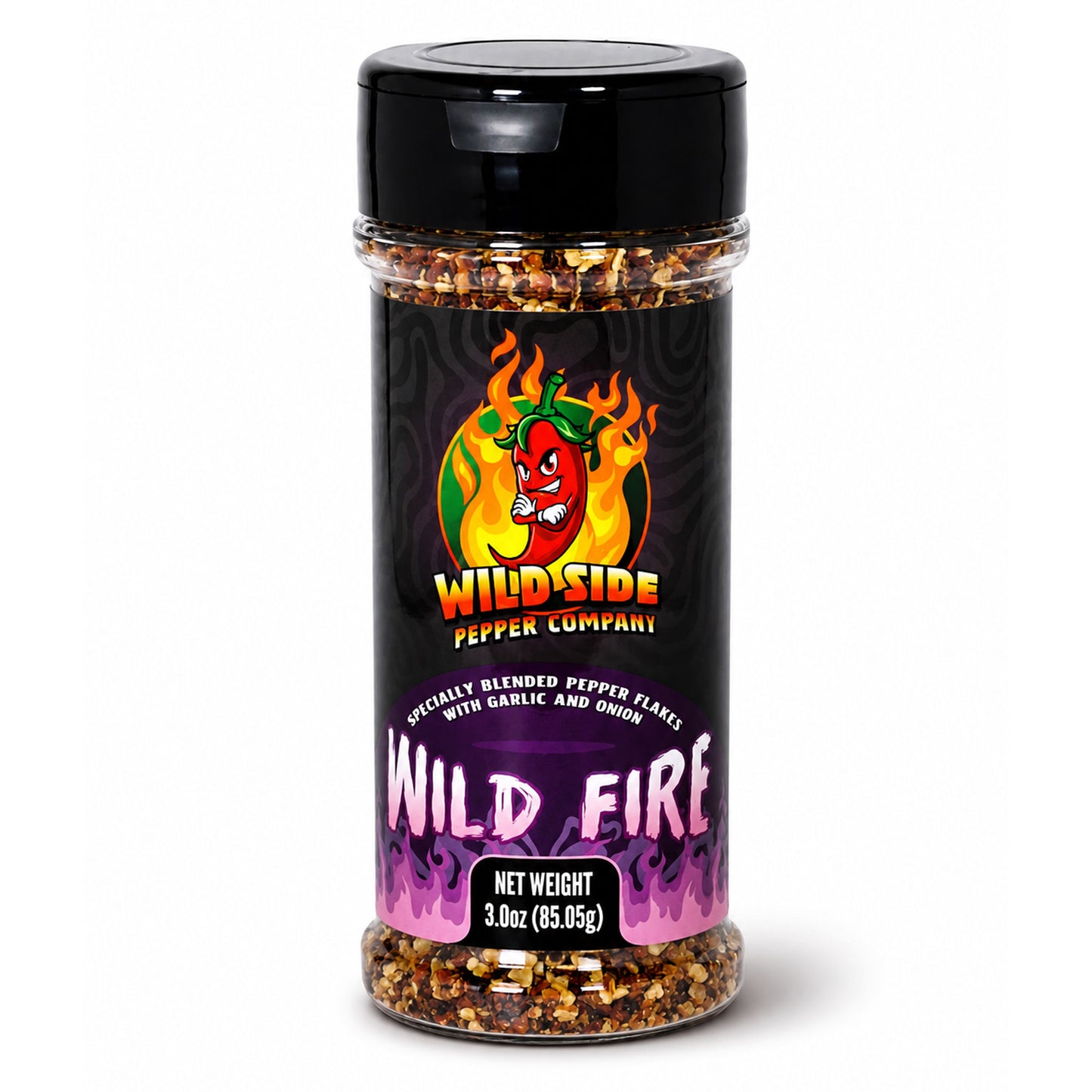A 3 oz clear plastic spice jar of Wild Side Pepper Company's 'Wild Fire' chili pepper flakes, featuring a black lid and a black label with a red chili pepper graphic and purple flames.