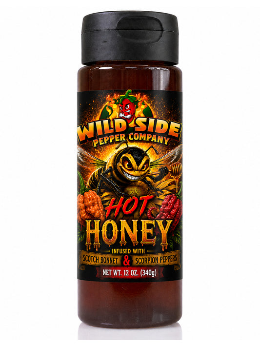 Hot Honey infused with chili peppers by Wild Side Pepper Company, blending pure honey with sweet heat and bold flavor for pizza, fried chicken, biscuits, wings, cheese boards, and more.